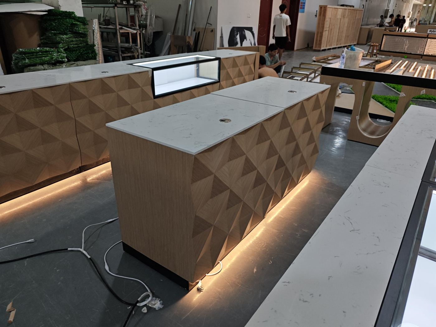 Faceted counters with lit plinths